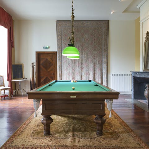 Challenge your guests to a round of billiards after dinner