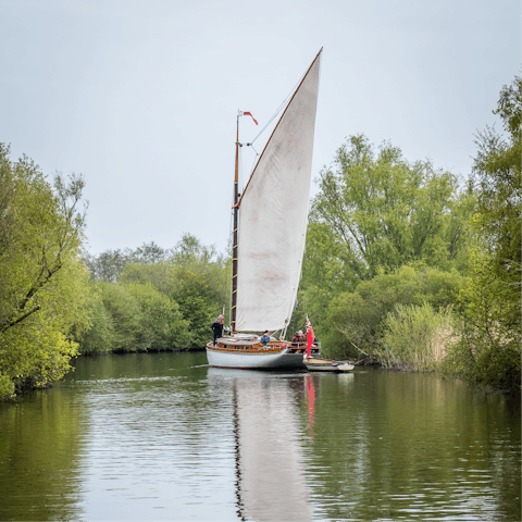 Spend a day boating out on The Broads, a thirty-minute drive away