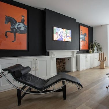 Relax on the Le Corbusier chaise in the living room