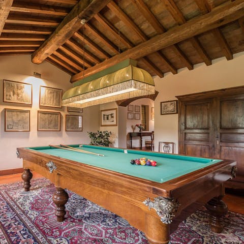 Entertain the group the good old-fashioned way on the pool table