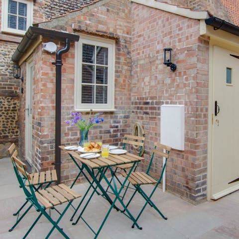 Take in the sea air with a glass of wine in the courtyard garden