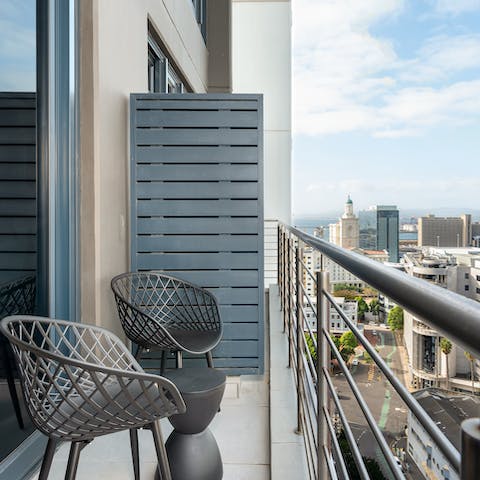 Sip a glass of South African wine on your private balcony