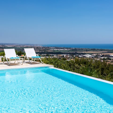 Take a dive into the gorgeous infinity pool