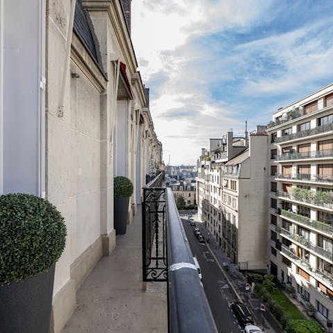 Pad out to the balcony and admire the typically Parisian views