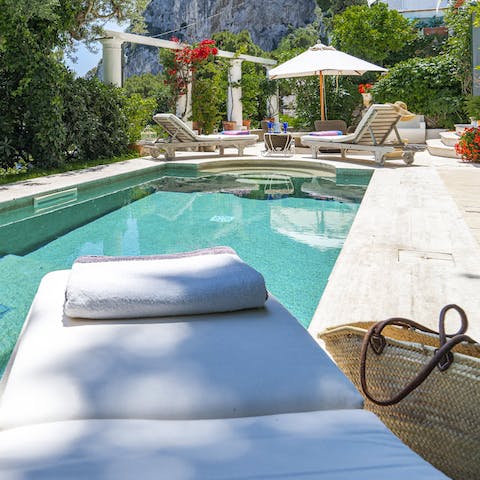 Grab a book and lounge by the pool