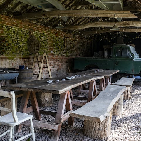 Dine alfresco in one of the repurposed barns on the farm