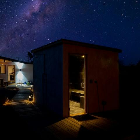 Detox under the stars in the four-person free standing steam sauna