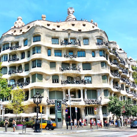 Walk for less than ten minutes to arrive at the iconic Casa Milà