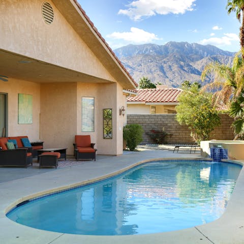 Enjoy incredible views of the mountains while you swim in the private pool