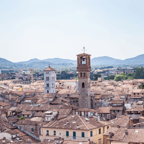 Wander the cobblestone streets of historic Lucca