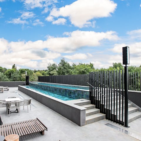 Cool off from the South African sunshine with a dip in the building's outdoor swimming pool