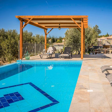 Catch some rays in the private pool while taking in sea views