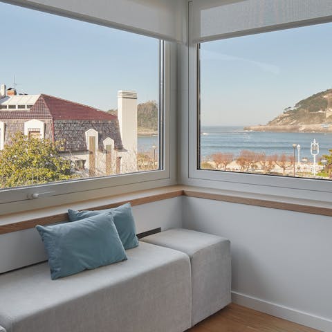 Take in the breathtaking views of La Concha Bay, right from the comfort of your window nook 