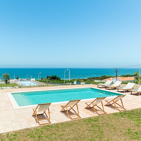 Admire sea views from a sun-soaked lounger by the private pool