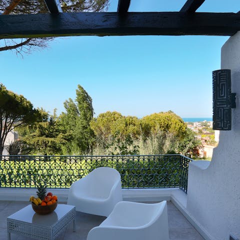 Take your morning coffee on the upstairs balcony with views stretching out to the Adriatic