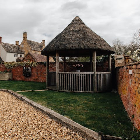 Enjoy easy alfresco living thanks to the covered dining area and barbecue