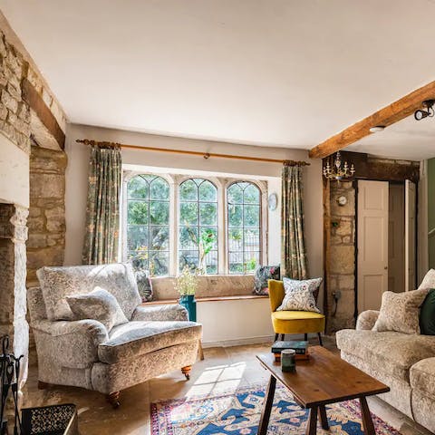 Spend cosy days relaxing, reading and enjoying the warmth of this home by the fire