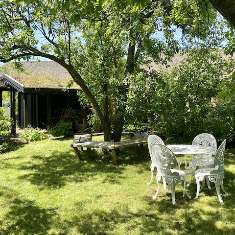 Step outside and experience the natural beauty of this setting from the garden