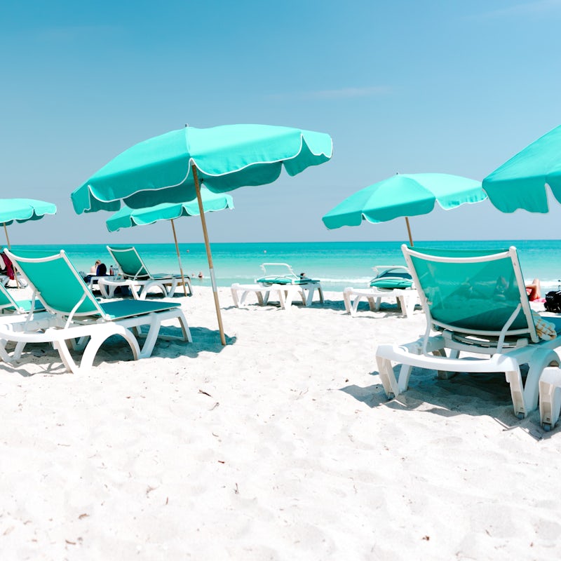 Relax on the pristine white sands of Miami Beach, under a five-minute stroll away