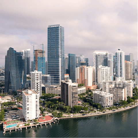 Visit Downtown Miami, a fifteen-minute drive from this home