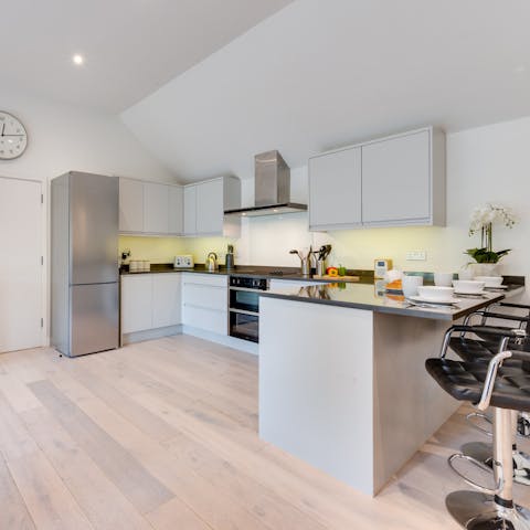 Cook, eat and socialise in the big, bright kitchen