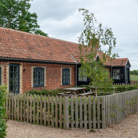 Eat outside on the picnic benches in your enclosed front garden
