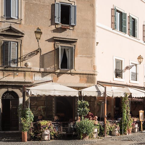 Stay in bohemian Trastevere, right across from the Piazza di San Calisto