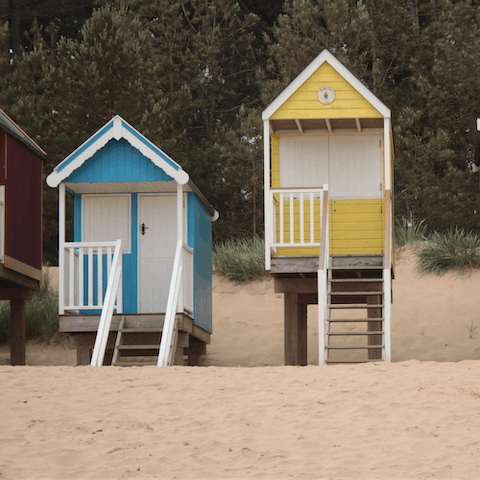 Hire yourself a beach hut for a classic day out at the British seaside – the charming port town of Wells-next-the-Sea is fifteen minutes away