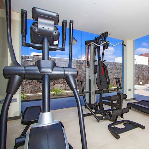 Stay active at the villa's private gym 