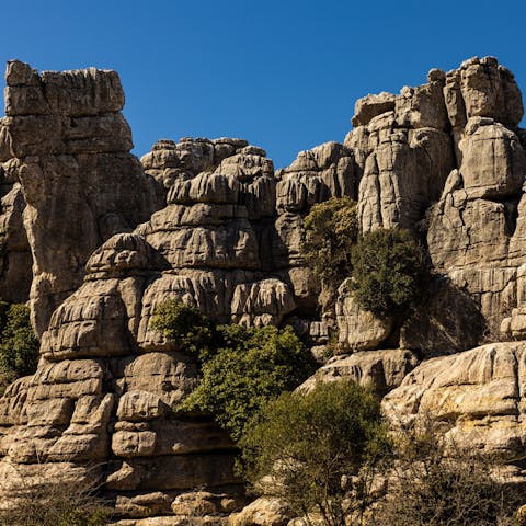 Explore the El Torcal de Antequera mountain ranges, a short drive away