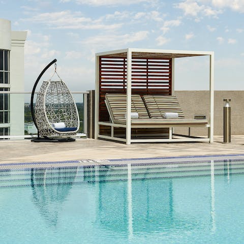 Swim in the communal pool or lounge in a cabana