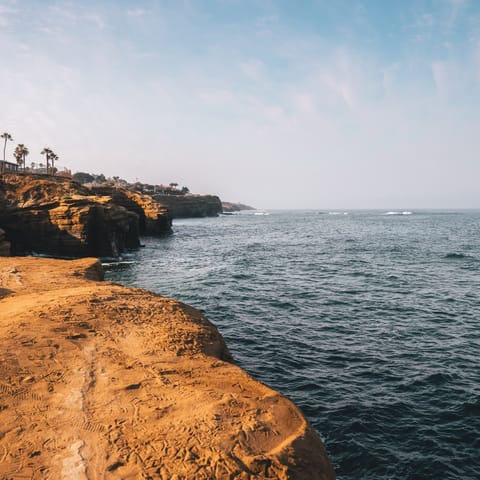 Stroll down to Sunset Cliffs with its intricate coastal bluffs and sea caves