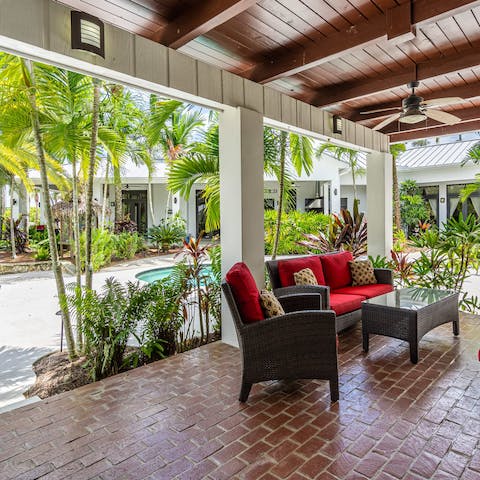 Take your morning coffee out onto the pool side terrace