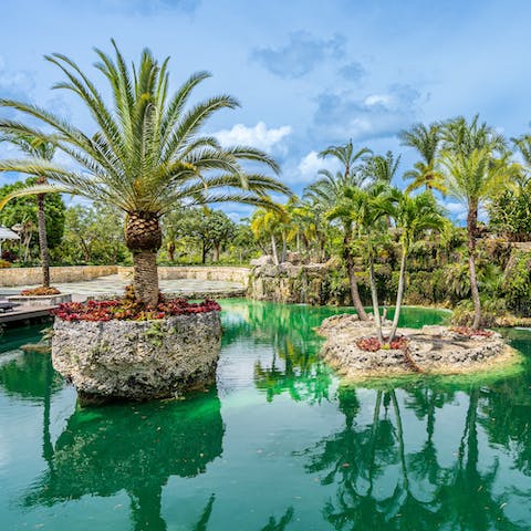 Laze on sun loungers overlooking this home's unique, emerald coloured pond
