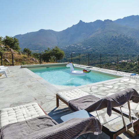 Enjoy the view from the comfort of a poolside lounger