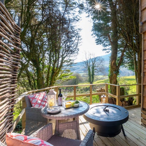Light the fire pit and toast to the beautiful surrounding countryside