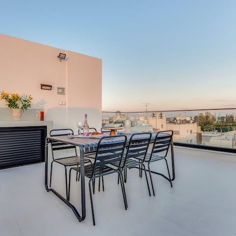 Tuck into a home-made meal on the rooftop terrace overlooking Limassol