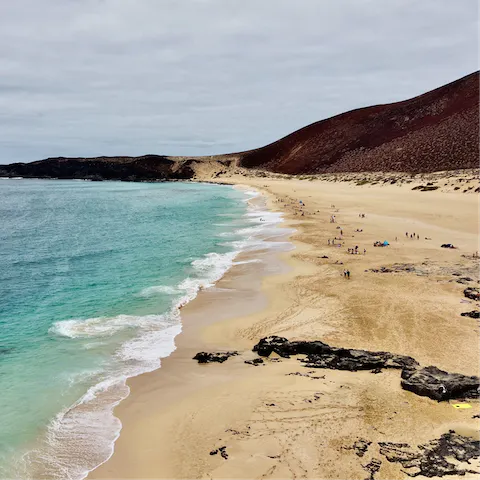 Go for a drive over to Playa de Papagayo nearby