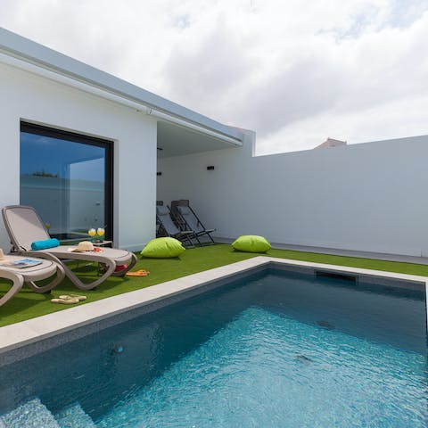 Cool off in the private pool after a day in the sand dunes