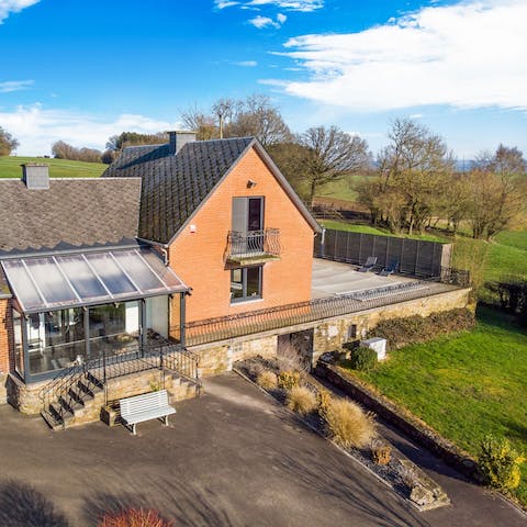 Enjoy sprawling views of the surrounding countryside from the raised patio