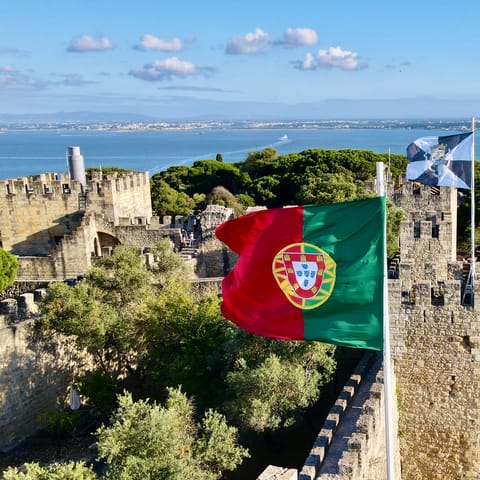 Visit the 8th-century Castelo de São Jorge, easily reached by foot or public transport