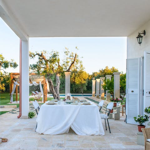 Set up the barbecue for an al fresco meal on the veranda