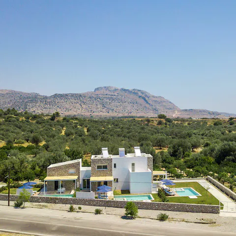 Stay in the Rhodes countryside, surrounded by olive groves and fields