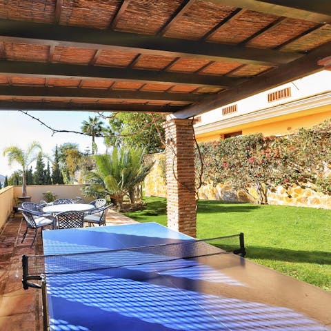 Challenge friends to a game of table tennis in the shade of the terrace after lunch