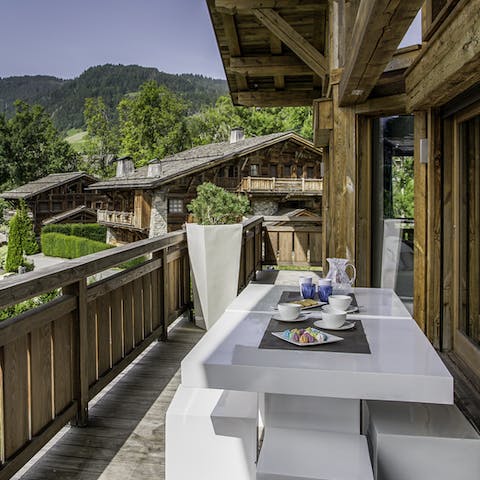 Sit out on the balcony and gaze out at the Alpine landscape