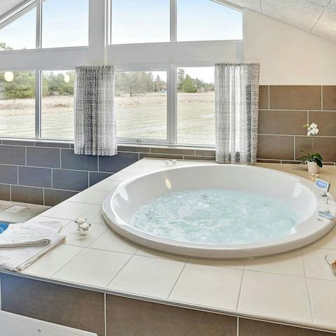 Unwind at the end of the day in the bubbling indoor Jacuzzi