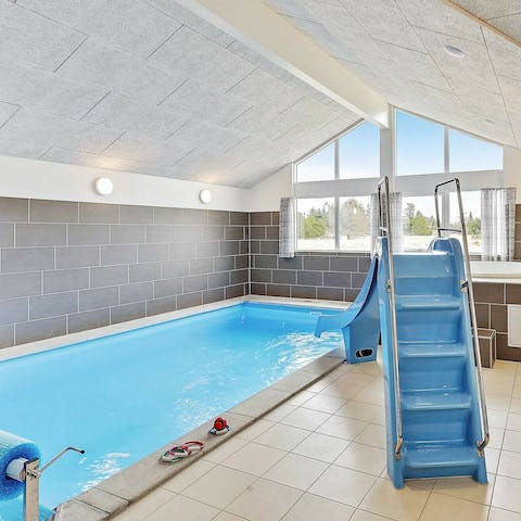 Slide into the indoor swimming pool, whatever the weather outside
