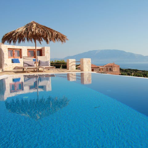 Swim leisurely laps in the infinity pool on scorching afternoons