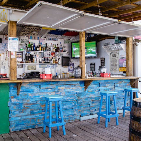 Grab a rum and coke at one of the nearby bars