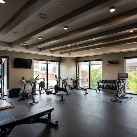 Head to the building's shared gym to keep on top of your game